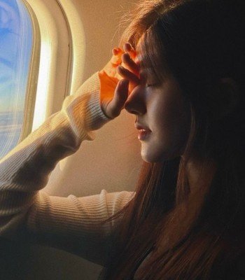 sad girl image in flight