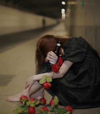 sad girl wearing black frock image